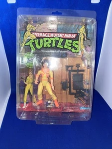 TMNT 1988 TEENAGE MUTANT NINJA TURTLES ORANGE APRIL O'NEIL 10 BACK UNPUNCHED MOC - Picture 1 of 4