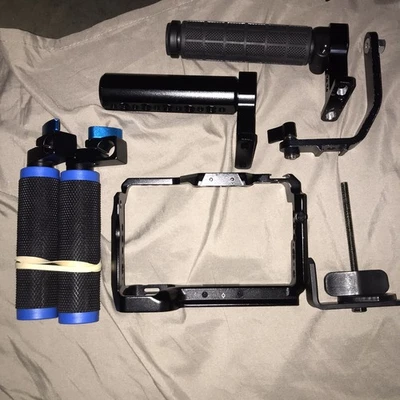 Kit de jaula y accesorios para cámara Sony FX# 2x manijas de plataforma pequeña 1 soporte largo + más Foto 1 de 4