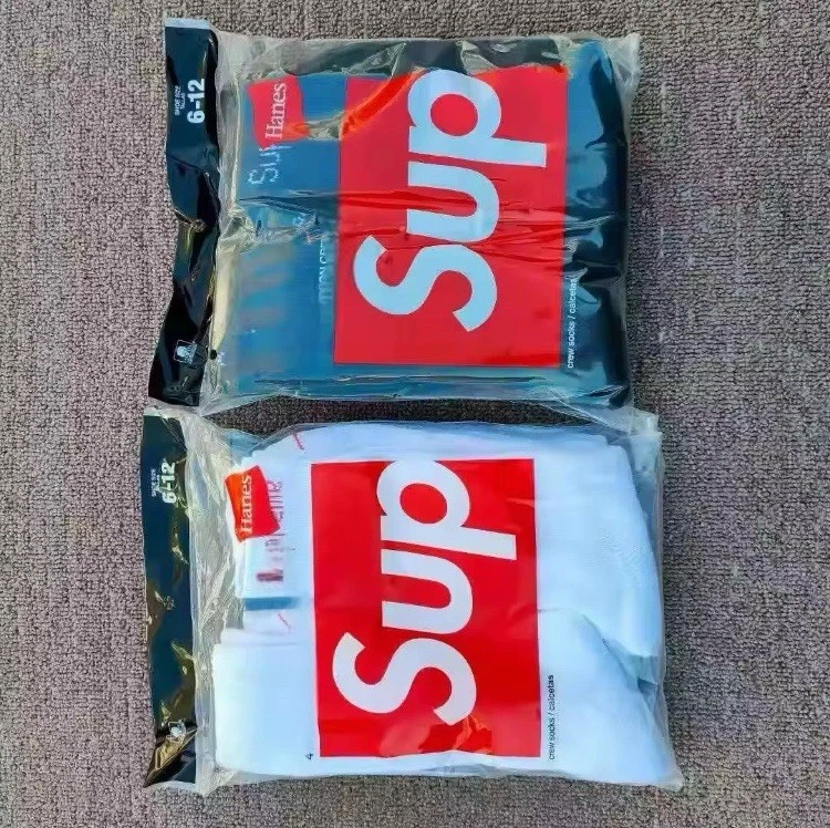 2 PARES CALCETINES CREW SUPREME COLOR BLANCO Y NEGRO Foto 1 de 1