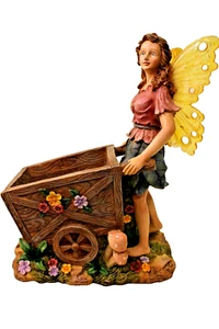 Large Fairy Pushing a Wheelbarrow through a Flower Garden - Picture 1 of 9
