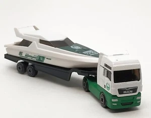 Majorette Man TGX Truck with Yacht Trailer - Dubai Police 1/100 (6") - Picture 1 of 6