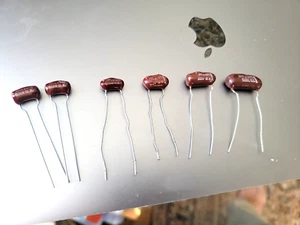 6 NOS Vintage EM GE Brown Drop .027,.02,.002, .003, and 2 .001 600v Capacitors - Picture 1 of 1