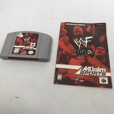 WWF ACTITUD NINTENDO 64 CON FOLLETO DE INSTRUCCIONES JUEGO AUTÉNTICO Etiqueta Daño Foto 1 de 3