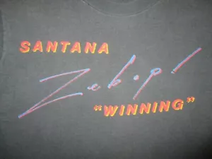 T-SHIRT CONCERTO CARLOS SANTANA vintage anni 80 punto singolo 1981 Zebop! Winning Tour SM - Foto 1 di 6