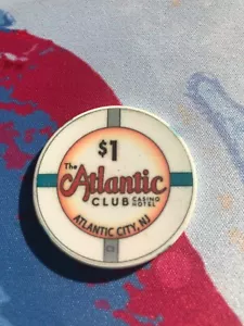 (1) $1. The Atlantic Club Casino Chip - 2012 - Atlantic City, New Jersey - Picture 1 of 2