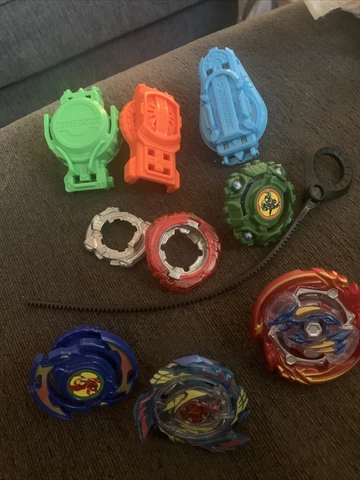Beyblades lot  Launchers Parts Hasbro Cover