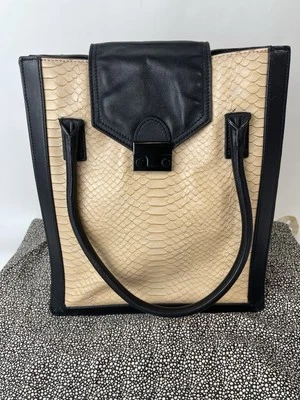 BOLSO DE TRABAJO LOEFFLER RANDALL CUERO SERPIENTE EN RELIEVE NEGRO PATRÓN DE LUNARES Foto 1 de 4