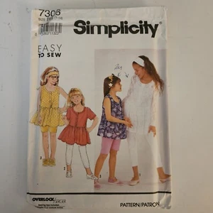 7306 Vintage Simplicity Schnittmuster Mädchen Leggings Baby Puppe Stirnband Strick - Bild 1 von 4