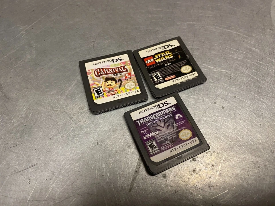 NINTENDO DS GAME LOT 💥 LEGO STARWARS TRANSFORMERS CARNIVAL GAMES - Image 1 of 1