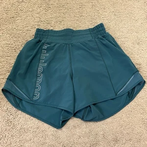 Lululemon Hotty Hot Short Size 2 Jasper Green Spell Out 4” Inseam - Picture 1 of 7