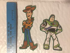 TOY STORY Bügelbild STOFF Applikationen KEIN NÄHEN 2 Stück Woody Buzz Lightyear - Bild 1 von 1