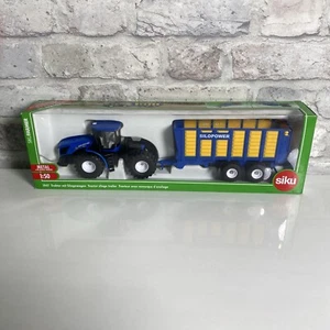 SIKU NO.1947 1:50 Scale NEW HOLLAND TRACTOR WITH SILAGE TRAILER Dicast Model Toy - Picture 1 of 6