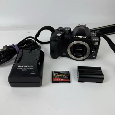 Cuerpo de cámara digital Olympus E-510 IS 10 MP SLR montaje de cuatro tercios SIN CUBIERTA DE BATERÍA Foto 1 de 4