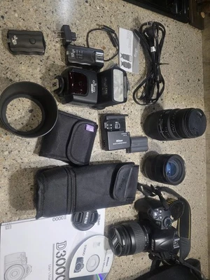 Nikon D3000 Digital SLR Kit;4 lenses,flash,filters,battery,charger,bag & card - Image 1 of 4