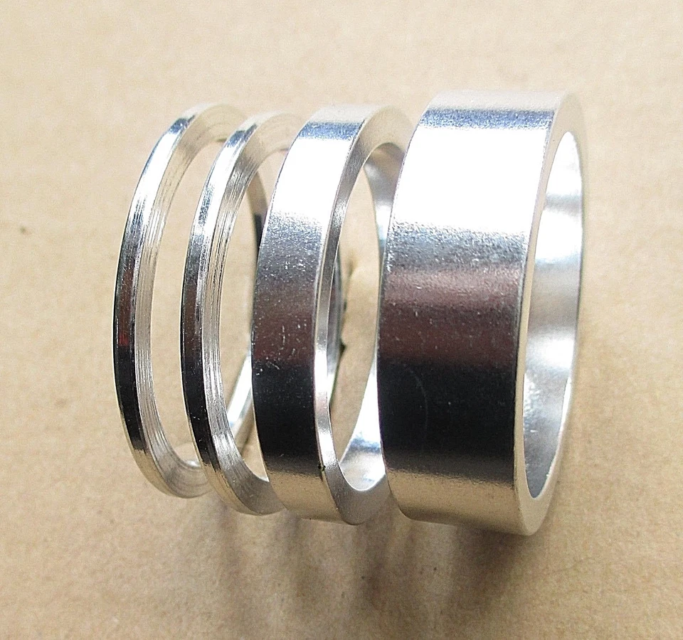 Juego espaciador de auriculares BMX Mountain Highbred bicicleta 1 1/8 2 mm 5 mm 10 mm aleación plata/negro Foto 1 de 1