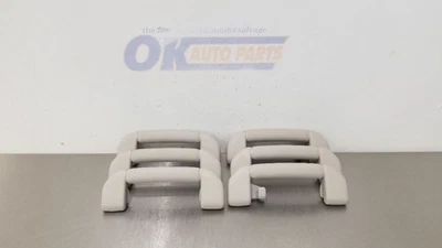 JUEGO DE MOLDURAS DE MANIJA DE AGARRE MONTADA EN TECHO NISSAN ARMADA 18 GRIS Foto 1 de 4