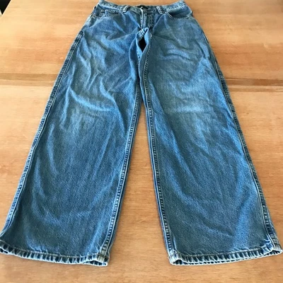 Pantalones de mezclilla rectos de pierna ancha Uniqlo para mujer 23 azul tiro medio tela Kaihara lavado medio Foto 1 de 4