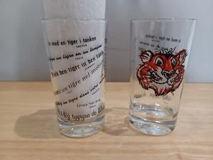 2 Vtg. Esso Tiger in Your Tank 5 1/2” Clear Glasses / 8 Languages - Picture 1 of 2