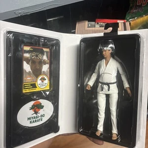 Cobra Kai Daniel LaRusso SDCC 2022 Exclusive 7" Action Figure VHS Clamshell Box - Picture 1 of 5
