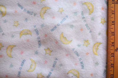 A STAR IS BORN ON WHITE  BRUSHED POLYESTER FABRIC  2 WAY STRETCH   3 YARDS - Image 1 of 2