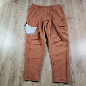 Nike NSW Tech Fleece Utility Hose Größe Large-Tall Burnt Orange Light Bone Schwarz - Bild 1 von 16