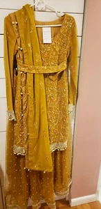 Pakistani / Indian Women's Yellow / Golden Heavy Chiffon and Net Lehenga - Picture 1 of 12