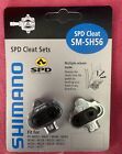 New Shimano SPD Cleat Sets SM-SH56 (4) and Used Shimano Pedals (1)