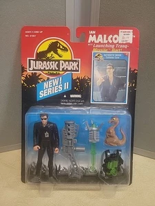Kenner Jurassic Park Serie 2 Ian Malcolm mit startender Tranq-Rakete Action... - Bild 1 von 7