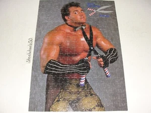 Rompecabezas de pastel de carne vintage WWF Brutus el barbero COMPLETO Milton Bradley 1990 WWE - Imagen 1 de 5