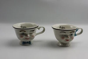 (2) Baileys Yum Coffee Mug Tea Cup Man and Woman Winking Eye - Picture 1 of 3