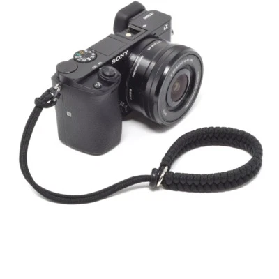 “Cordy Crossover” Black Paracord Camera Wrist Strap - Handmade by Cordweaver - Image 1 of 4