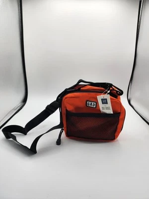 Bolsa utilitaria de viaje GAP para niños naranja correa ajustable 3 compartimentos con funda de CD Foto 1 de 4