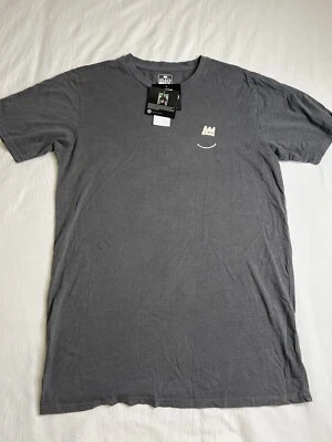 Camiseta Target Black History “Black Men Smile” “JOY”.  Gris Talla XS Foto 1 de 4