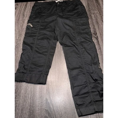 Pantalones cargo negros para hombre estilo jogger bolsillos con cremallera cintura elástica talla mediana Foto 1 de 4