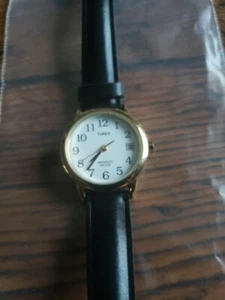 Timex Indiglo Watch Women Gold Tone Date Round Black Band New Battery 8.5" 25mm - Picture 1 of 4
