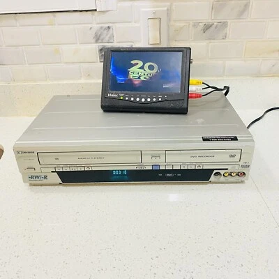 Emerson EWR20V5 VCR/DVD Recorder DVD VCR Combo W/ RCA Cable Tested - Image 1 of 4