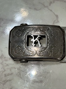 Antiguo cinturón Hickok plateado frontal hebilla monograma "K" estampado floral. - Imagen 1 de 5