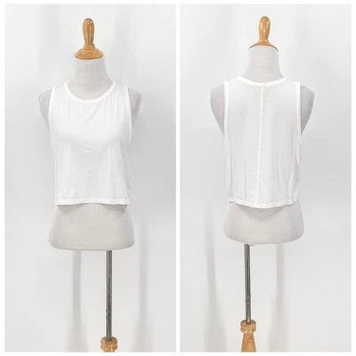 Camiseta sin mangas recortada ARITZIA BABATON para mujer pequeña blanca relajada atletismo Foto 1 de 4