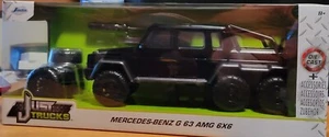 BRAND NEW JADA JUST TRUCKS MERCEDES-BENZ G 63 AMG 6X6 TRIPLE BLACK W/XTRA TIRES - Picture 1 of 1