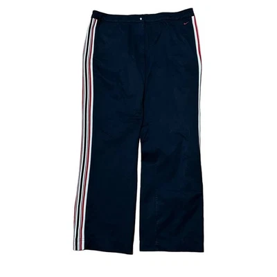 Pantalones deportivos Nike cortavientos negros de nailon para niños grandes 12-14 rojo blanco a rayas en la pierna Foto 1 de 3