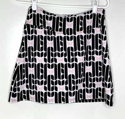 Falda corta de golf Golftini para mujer S pequeña hermandad falda corta negra rosa estampada tejida Foto 1 de 4