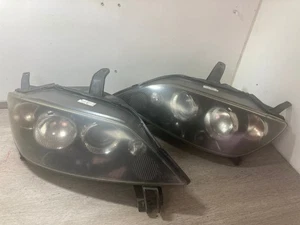2006 MAZDA 2 PASSENGER & DRIVER SIDE FRONT HEADLIGHTS PAIR - Picture 1 of 16