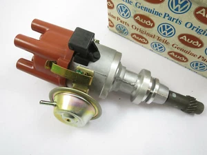 original Audi 100 Typ 44 2.2l 5 Zyl. WU Zündverteiler 035905205AM 0237030005 NEU - Picture 1 of 5