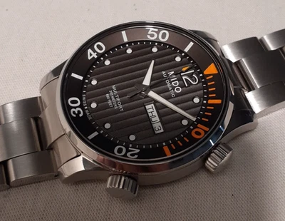 MIDO MULTIFORT TWO CROWNS AUTOMATIC, SWISS MADE, DAY DATE, SEE THROUGH BACK,MINT - Image 1 of 4