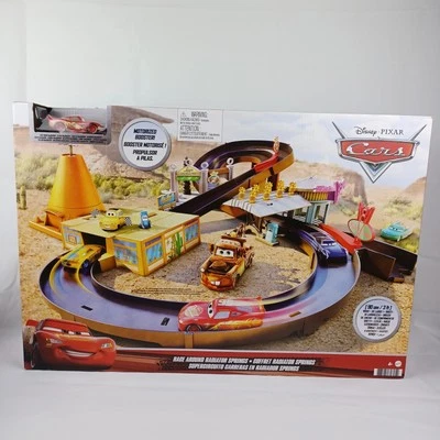 DISNEY PIXAR CARS RACE AROUND RADIATOR SPRINGS NEW - Image 1 of 4