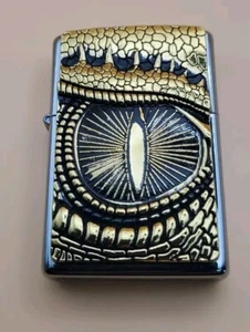 Zippo Lighter With A Golden Dragon Eye Medallion, Polished Chrome, Ununused - Picture 1 of 5