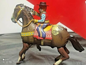 VINTAGE COWBOY AND HORS WIND UP TOY JAPAN ''HAJI'' 50's TIN FABRIC METAL RUBBER  - Picture 1 of 12
