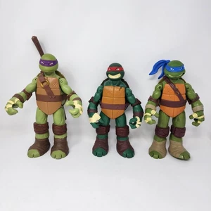 Playmates Teenage Mutant Ninja Turtles TMNT 11 in Actionfiguren 2012 (3 Stück) - Bild 1 von 18