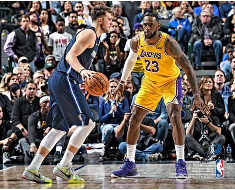 Luka Doncic Dallas Mavericks Unsigned Dribbling vs. LeBron James Photograph Cover