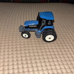 Tractor ERTL 1/64 New Holland 8970 con dobles - Imagen 1 de 6
